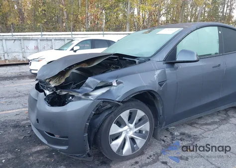 2023 Tesla Model Y Awd/Long Range Dual Motor All-Wheel Drive z USA, uszkodzony, nr VIN 7SAYGDEE1PF749270